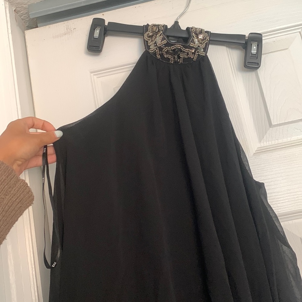 Elegant small black dress with neck piece, size S, barely worn.